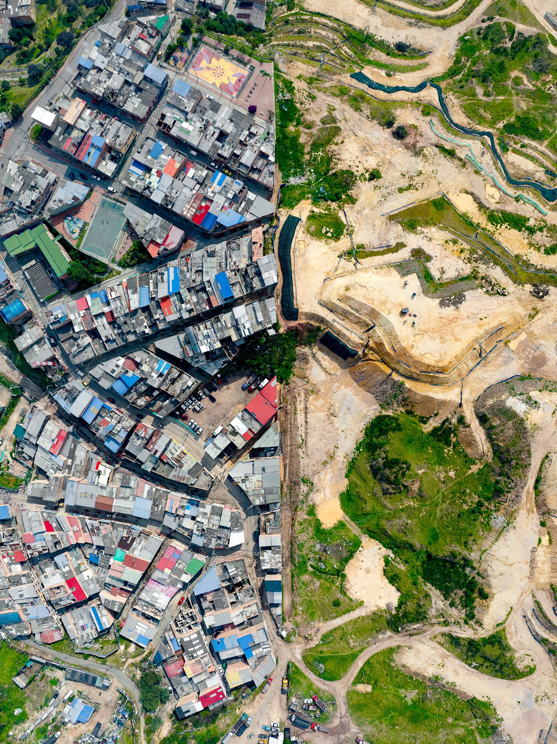 New construction climbs the hillside in Arboleda Sur, a working-class neighborhood on Bogotá’s southeastern hills.