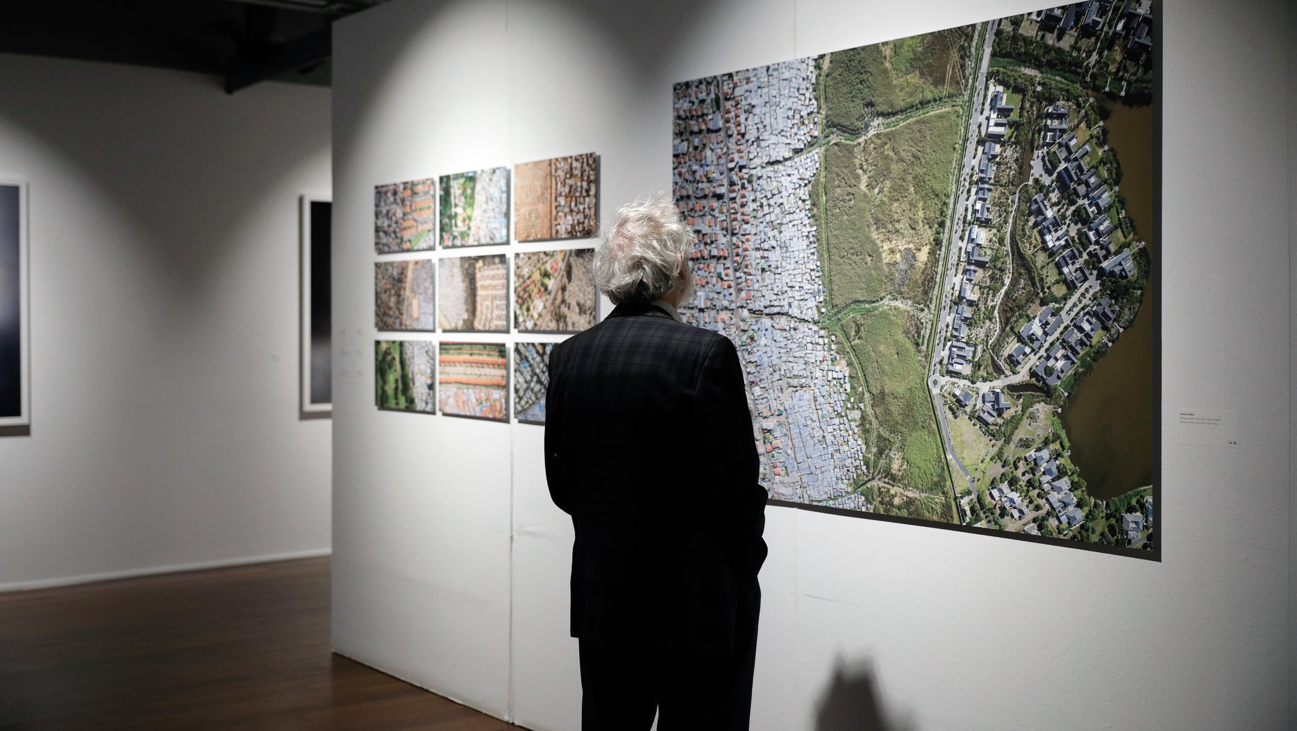 person looking at picture in a gallery